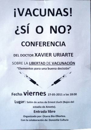 Cartel de una conferencia antivacunas en San Sebastián.
